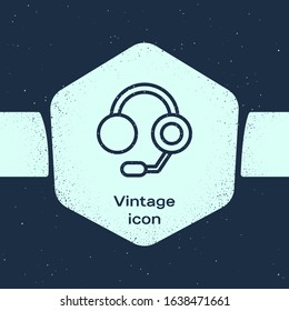 Grunge line Headphones icon isolated on blue background. Earphones. Concept for listening to music, service, communication and operator. Monochrome vintage drawing. Vector Illustration