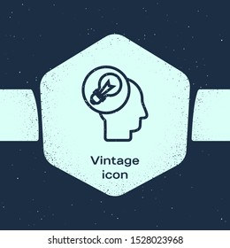 Grunge line Human head with lamp bulb icon isolated on blue background. Monochrome vintage drawing. Vector Illustration