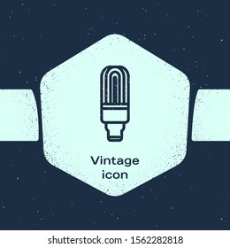 Grunge line LED light bulb icon isolated on blue background. Economical LED illuminated lightbulb. Save energy lamp. Monochrome vintage drawing. Vector Illustration