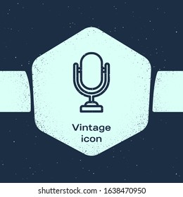 Grunge line Microphone icon isolated on blue background. On air radio mic microphone. Speaker sign. Monochrome vintage drawing. Vector Illustration
