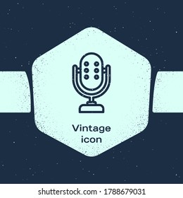 Grunge line Microphone icon isolated on blue background. On air radio mic microphone. Speaker sign. Monochrome vintage drawing. Vector