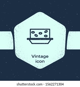 Grunge line Nougat with nuts icon isolated on blue background. Monochrome vintage drawing. Vector Illustration