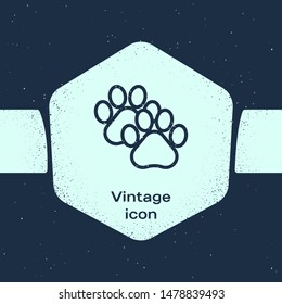 Grunge line Paw print icon isolated on blue background. Dog or cat paw print. Animal track. Monochrome vintage drawing. Vector Illustration