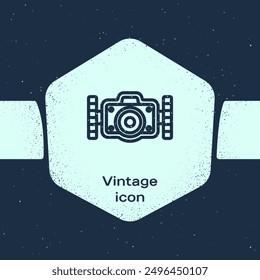 Grunge line Photo camera for diver icon isolated on blue background. Foto camera icon. Diving underwater equipment. Monochrome vintage drawing. Vector