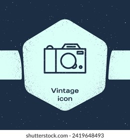 Grunge line Photo camera icon isolated on blue background. Foto camera icon. Monochrome vintage drawing. Vector