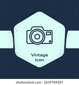 Grunge line Photo camera icon isolated on blue background. Foto camera icon. Monochrome vintage drawing. Vector