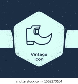 Grunge line Saint Patricks day irish tradition leprechaun boots icon isolated on blue background. Monochrome vintage drawing. Vector Illustration