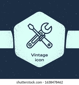 Grunge line Screwdriver and wrench tools icon isolated on blue background. Service tool symbol. Monochrome vintage drawing. Vector Illustration