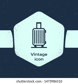 Grunge line Suitcase for travel icon isolated on blue background. Traveling baggage sign. Travel luggage icon. Monochrome vintage drawing. Vector Illustration