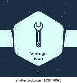 Grunge line Wrench icon isolated on blue background. Spanner icon. Monochrome vintage drawing. Vector Illustration