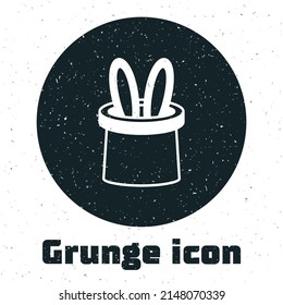 Grunge Magician hat and rabbit ears icon isolated on white background. Magic trick. Mystery entertainment concept. Monochrome vintage drawing. Vector