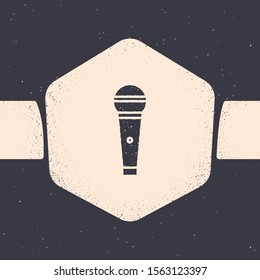 Grunge Microphone icon isolated on grey background. On air radio mic microphone. Speaker sign. Monochrome vintage drawing. Vector Illustration