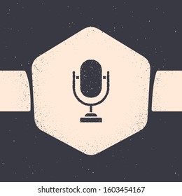 Grunge Microphone icon isolated on grey background. On air radio mic microphone. Speaker sign. Monochrome vintage drawing. Vector Illustration