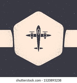 Grunge Old retro vintage plane icon isolated on grey background. Flying airplane icon. Airliner sign. Monochrome vintage drawing. Vector Illustration