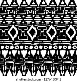 Grunge pattern. Ethnic fabric design. Aztec. Tribal. Boho. Fashion. Paint lines ornament. Ink strokes. Abstract seamless texture. Black and white. Fabric design. Traditional pattern. Hand drawn.