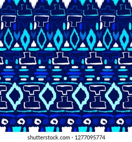 Grunge pattern. Ethnic fabric design. Aztec. Tribal. Boho. Fashion. Paint lines ornament. Ink strokes. Abstract seamless texture.