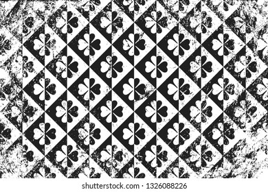 Grunge pattern with icon of clover. Horizontal black and white background.