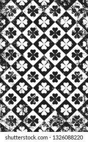 Grunge pattern with icon of clover. Vertical black and white background.