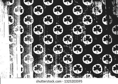 Grunge pattern with shamrock. Horizontal black and white background.
