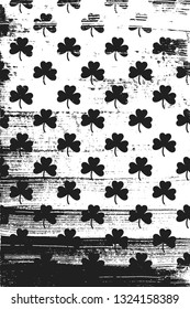 Grunge pattern with shamrock. Vertical black and white background.