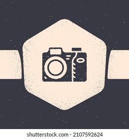 Grunge Photo camera icon isolated on grey background. Foto camera icon. Monochrome vintage drawing. Vector
