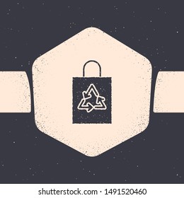 Grunge Plastic bag with recycle icon isolated on grey background. Bag with recycling symbol. Monochrome vintage drawing. Vector Illustration