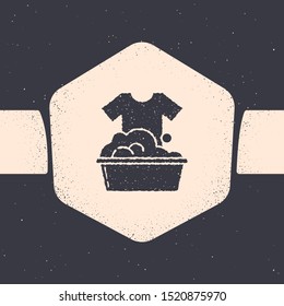 Grunge Plastic basin with soap suds icon isolated on grey background. Bowl with water. Washing clothes, cleaning equipment. Monochrome vintage drawing. Vector Illustration