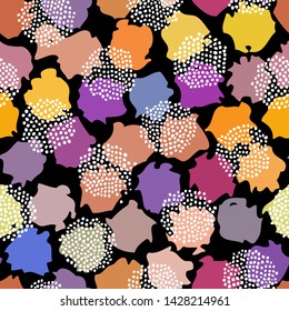 Grunge polka dot pattern on black background. Seamless pattern. Vector image.