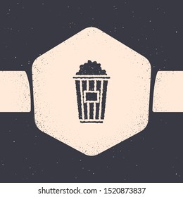 Grunge Popcorn in cardboard box icon isolated on grey background. Popcorn bucket box. Monochrome vintage drawing. Vector Illustration