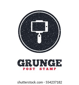 Grunge post stamp. Circle banner or label. Monopod selfie stick icon. Self portrait tool. Dirty textured web button. Vector