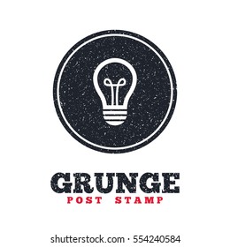 Grunge post stamp. Circle banner or label. Light lamp sign icon. Idea symbol. Dirty textured web button. Vector