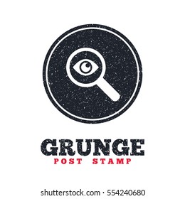 Grunge post stamp. Circle banner or label. Investigate icon. Magnifying glass with eye symbol. Dirty textured web button. Vector