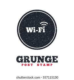 Grunge post stamp. Circle banner or label. Free wifi sign. Wifi symbol. Wireless Network icon. Wifi zone. Dirty textured web button. Vector