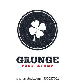 Grunge post stamp. Circle banner or label. Clover with four leaves sign icon. Saint Patrick symbol. Dirty textured web button. Vector