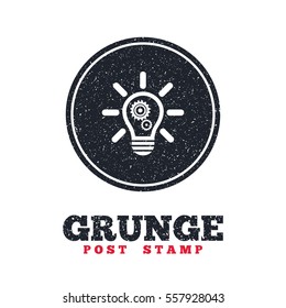 Grunge post stamp. Circle banner or label. Light lamp sign icon. Bulb with gears and cogs symbol. Idea symbol. Dirty textured web button. Vector