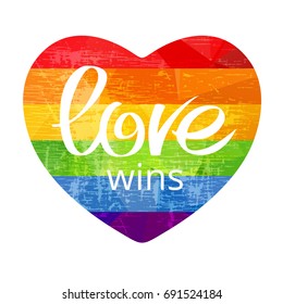 Grunge rainbow heart with Love Wins isolated on white background. Gay pride symbol. LGBT community symbol. Design element for greeting cards or etc.