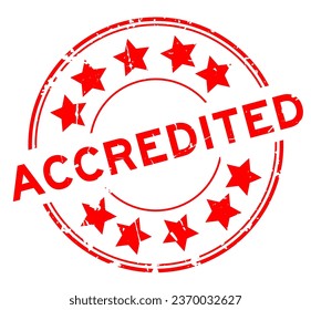 Grunge red accredited word round rubber seal stamp on white background