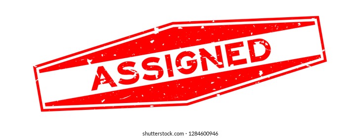 Grunge red assigned word hexagon rubber seal stamp on white background