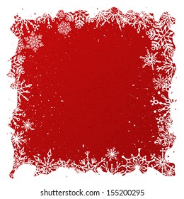 Grunge red Christmas background. Ornate white snowflakes on red background. Christmas template with place for your text on red area.