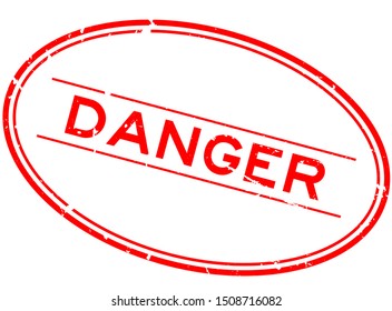 Grunge red danger word oval rubber seal stamp on white background