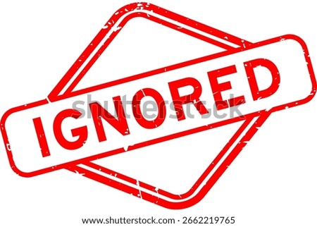 Grunge red ignored word rubber seal stamp on white background
