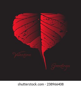 The grunge red leaf-style heart on black background. Use to create your Valentine's day postcard and labels or to design your own printed T-shirts.
