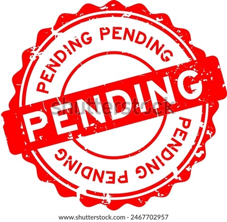 Grunge red pending word round rubber seal stamp on white background