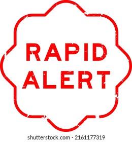 Grunge red rapid alert word rubber seal stamp on white background