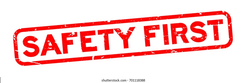 Grunge red safety first square rubber seal stamp on white background