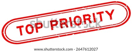 Grunge red top priority word rubber seal stamp on white background