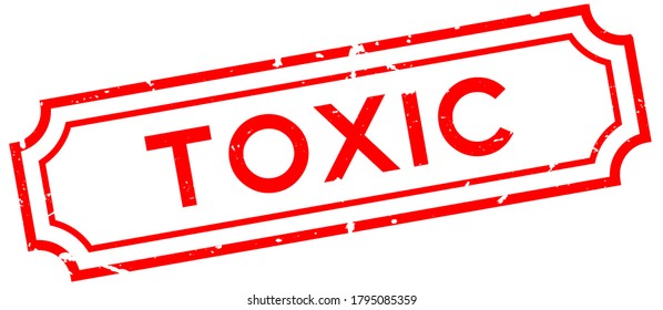 Grunge red toxic word rubber seal stamp on white background