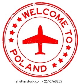 Grunge red welcome to Poland word with airplane icon round rubber seal stamp on white background