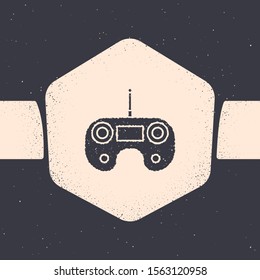 Grunge Remote control icon isolated on grey background. Monochrome vintage drawing. Vector Illustration