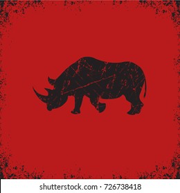 grunge rhinoceros on red background, vector illustration